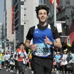 Jackupuncture founder participating in a marathon, emphasizing endurance, dedication, and holistic fitness.