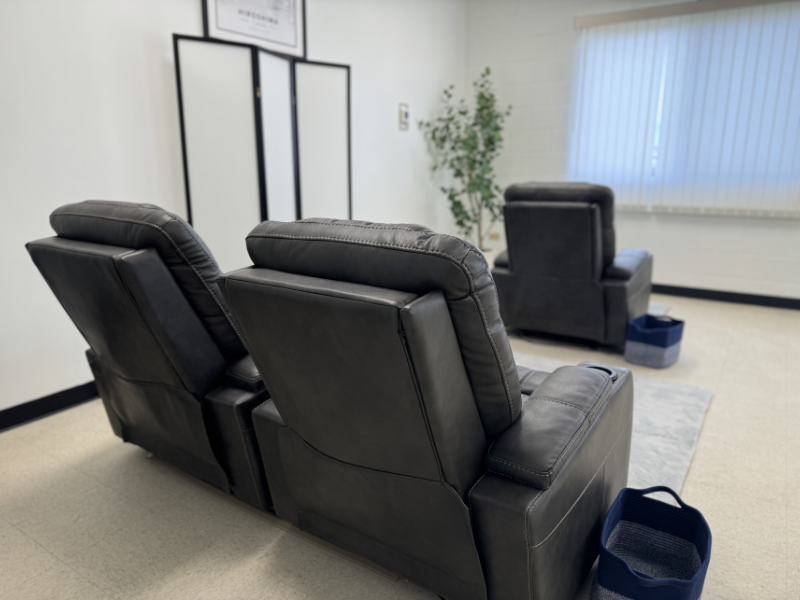 Relax in Jackupuncture's serene treatment lounge, featuring comfortable reclining chairs designed for ultimate relaxation and healing.